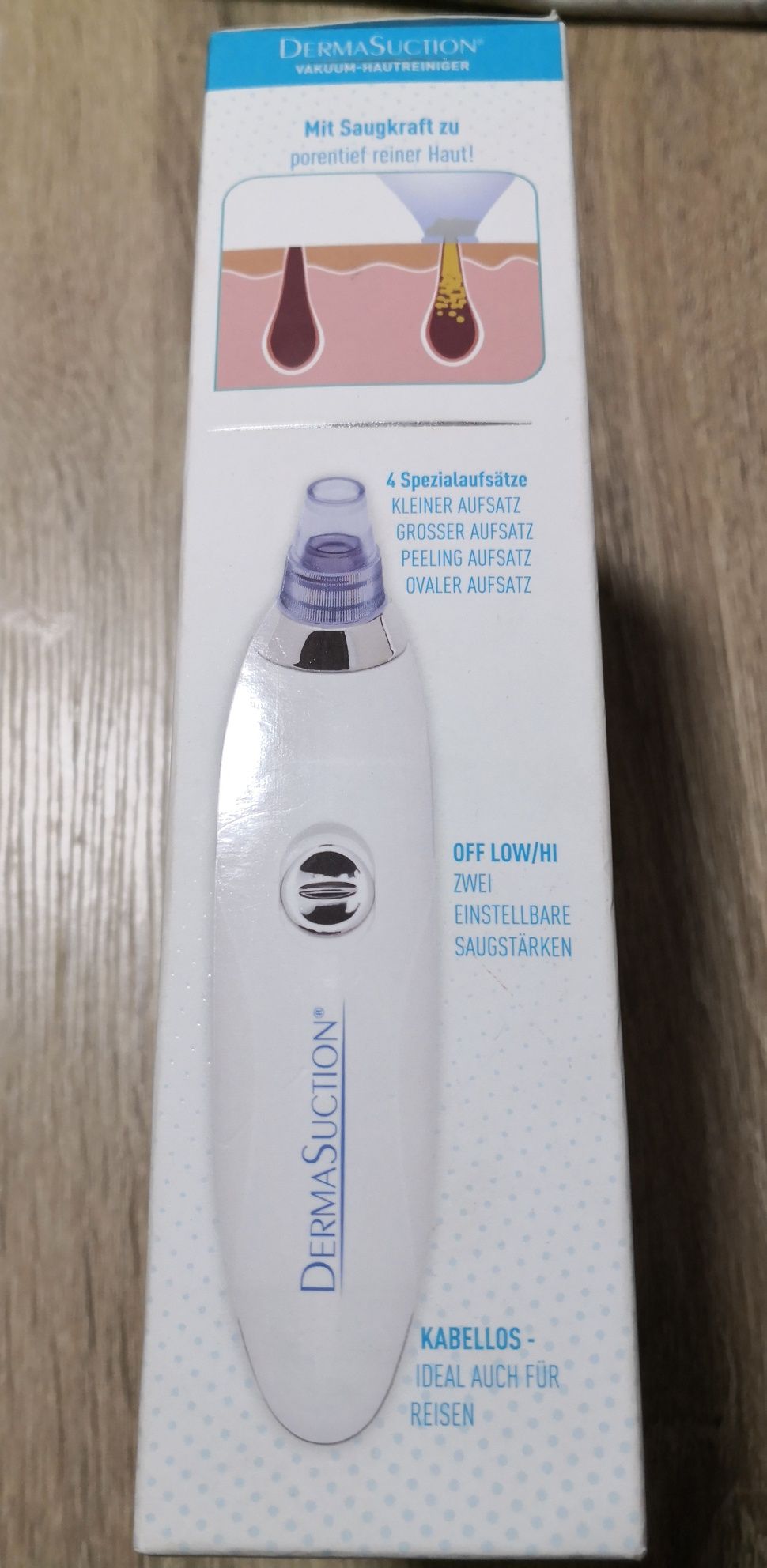 Aparat/ aspirator de curățare facial.