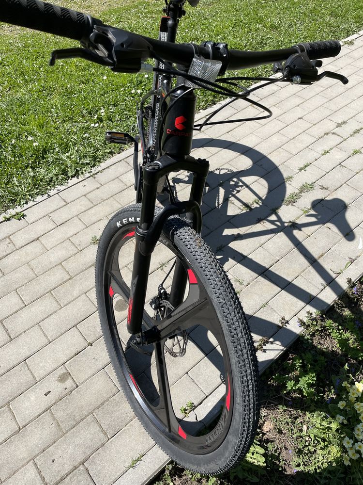 Vand bicicleta cu roti de magneziu