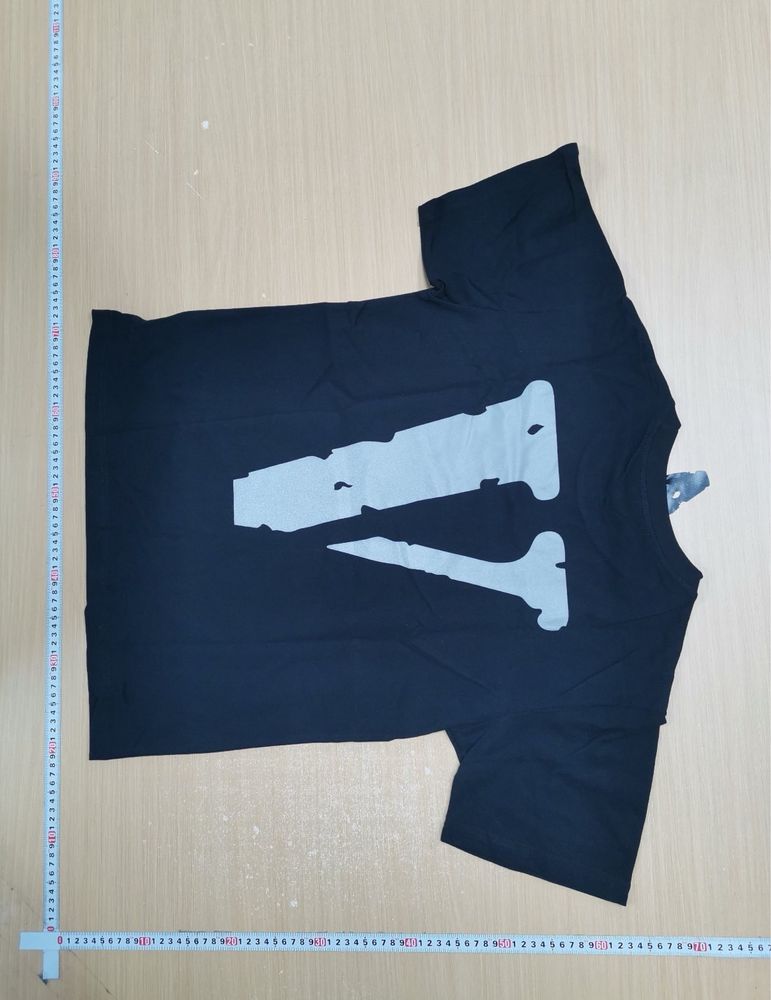 Vlone grey tee.