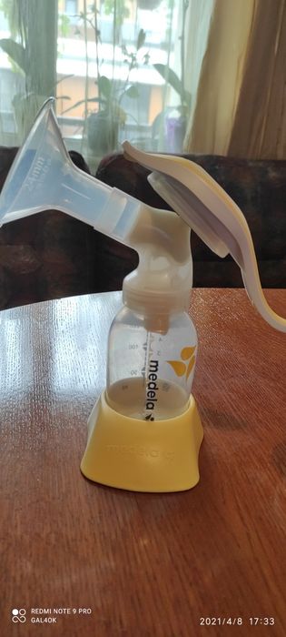 Ръчна двуфазна помпа за кърма Medela harmony .