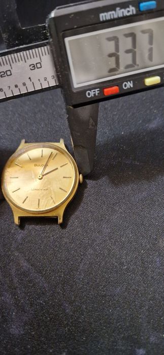 Vand ceas Bulova Longchamp.