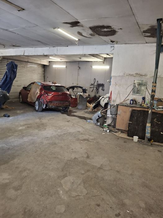 Автосервиз с камера за боядисване