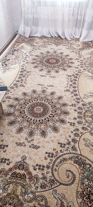 Ковёр в хорошом состояние