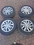 Vand cauciucuri bridgestone 15 cu jante de tabla