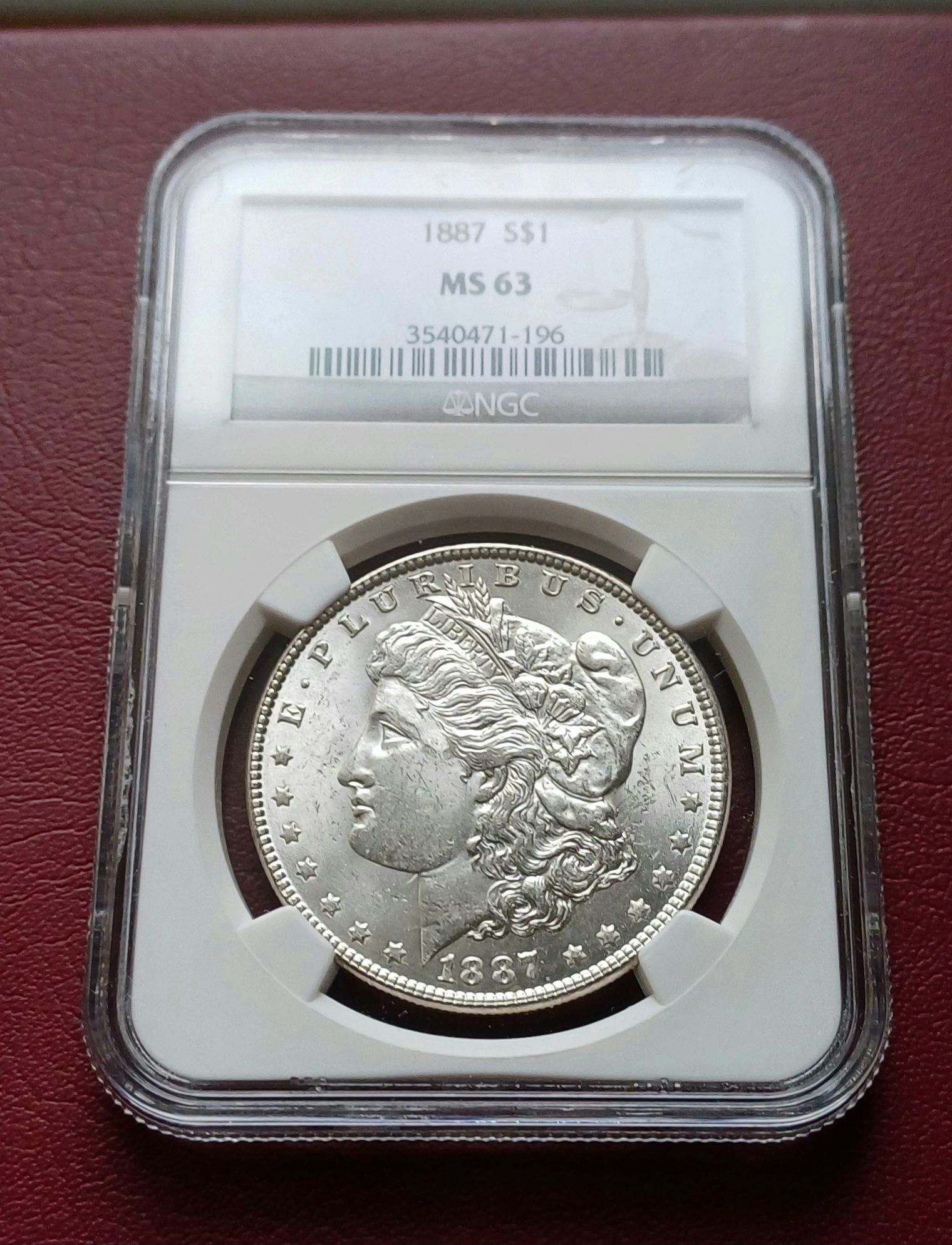 Монети от САЩ. Морган долар 1887 г. в грейд MS63 и MS64
