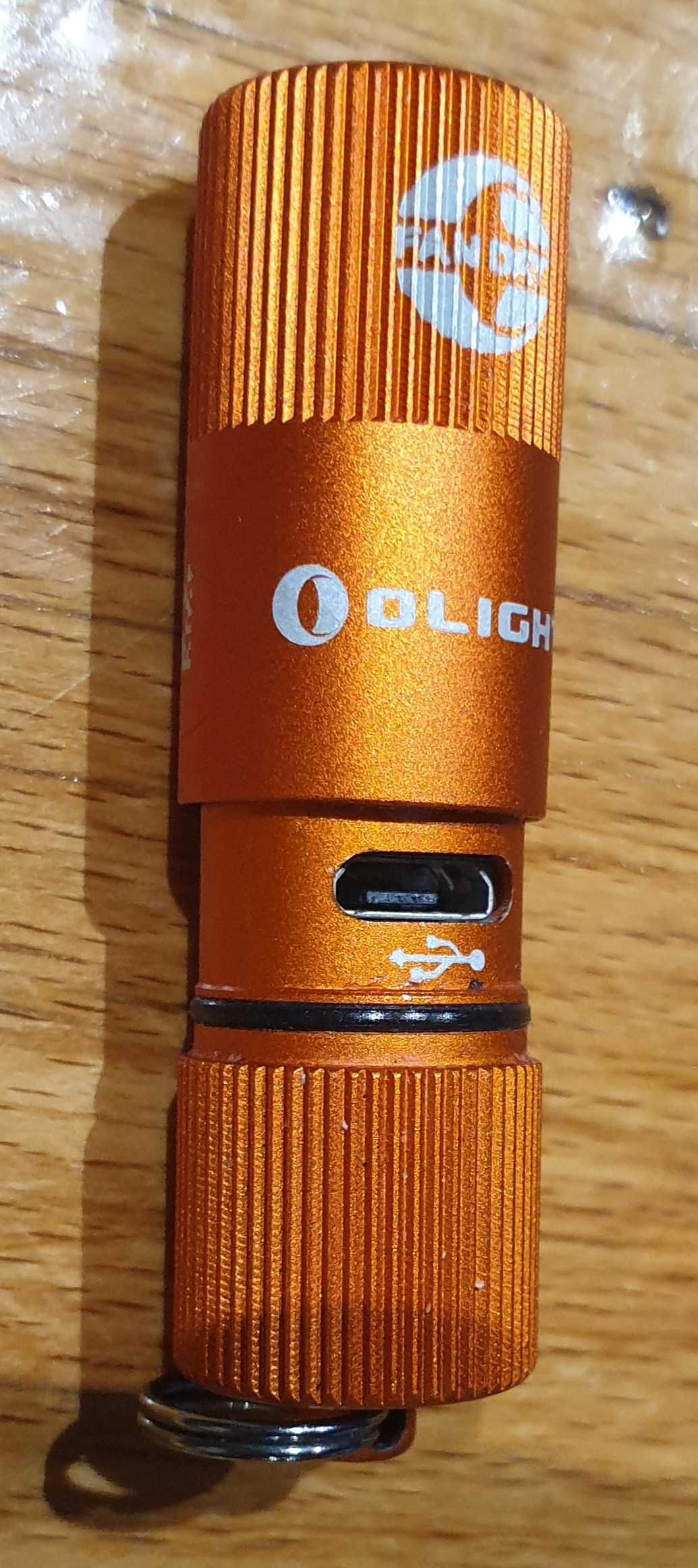 Нов LED фенер Olight i1R 2 EOS (14 грама до 150 лумена) - оранжев