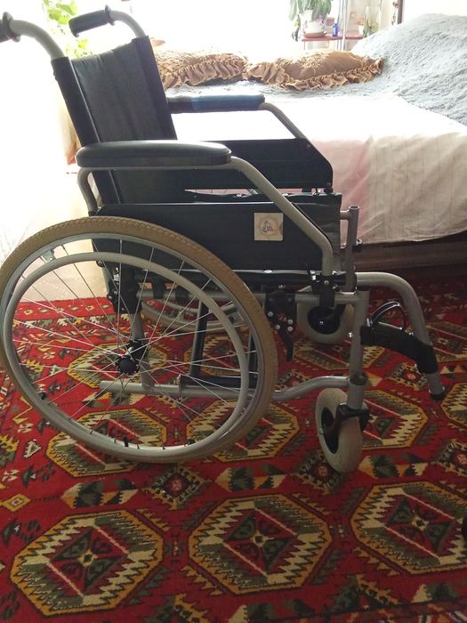 Инвалидная коляска