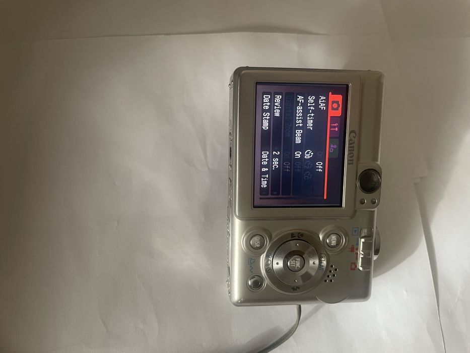 Canon Ixus 50 ,metal , made in Japan, afisaj data ora pe poze