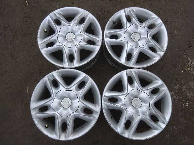 Продам оригинальные легкосплавные диски R14 на автомашину Mazda