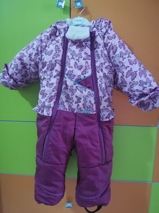 Продам  зимний конверт комбинезон для девочки