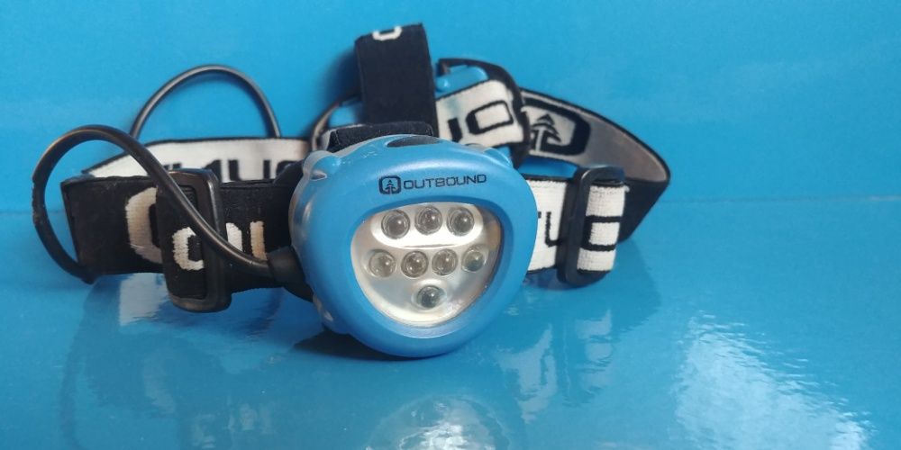 lanterna frontala OUTBOUND ADVENTURER ,8 LED, 3 moduri, 3 bat, Canada