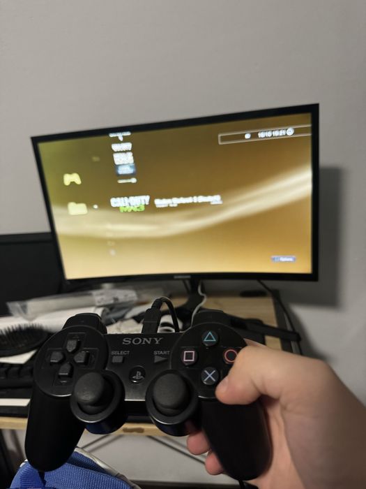 Playstation 3 slim - 120gb cu 6 jocuri si controller