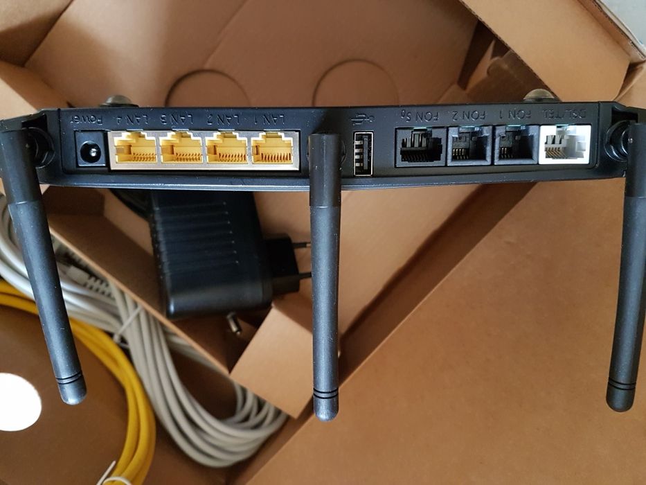 Router profesional FRITZ Box 7330 si router Tp link made in Germany