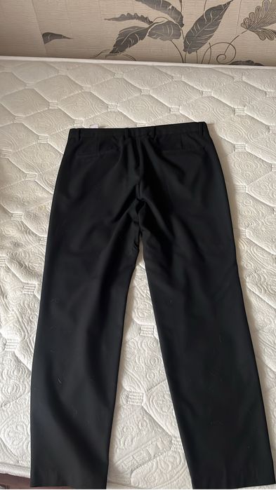 продам  черные брюки школьные