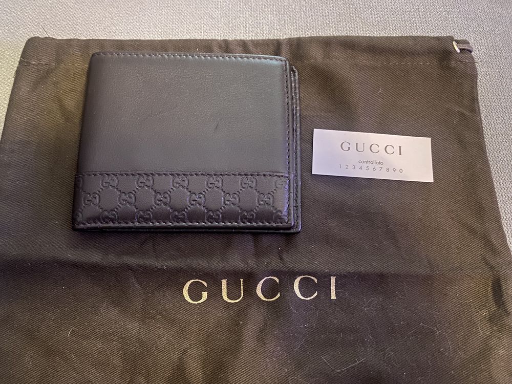 Doua portofele Gucci si Dupont