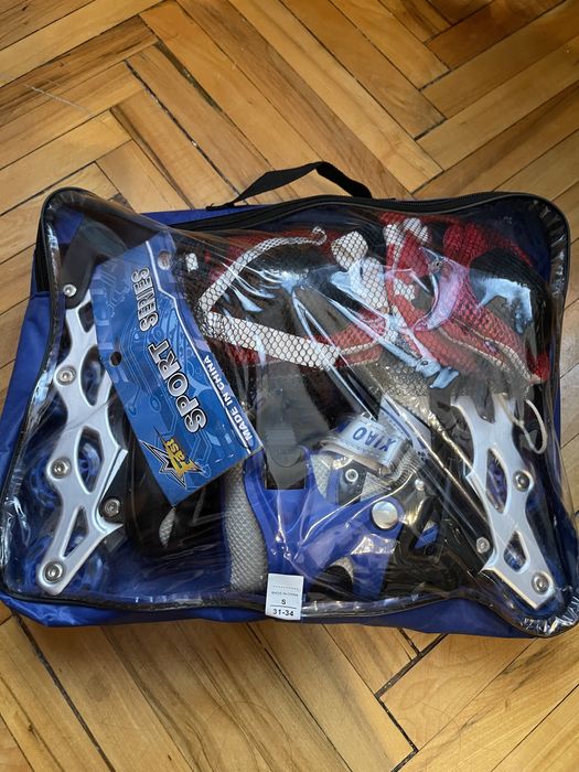 Роликовые коньки новые