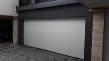 Usa de garaj sectionala izolata de la XPT DOORS 2500L/2000H