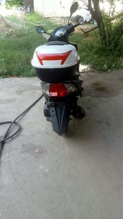 Скутер мопед