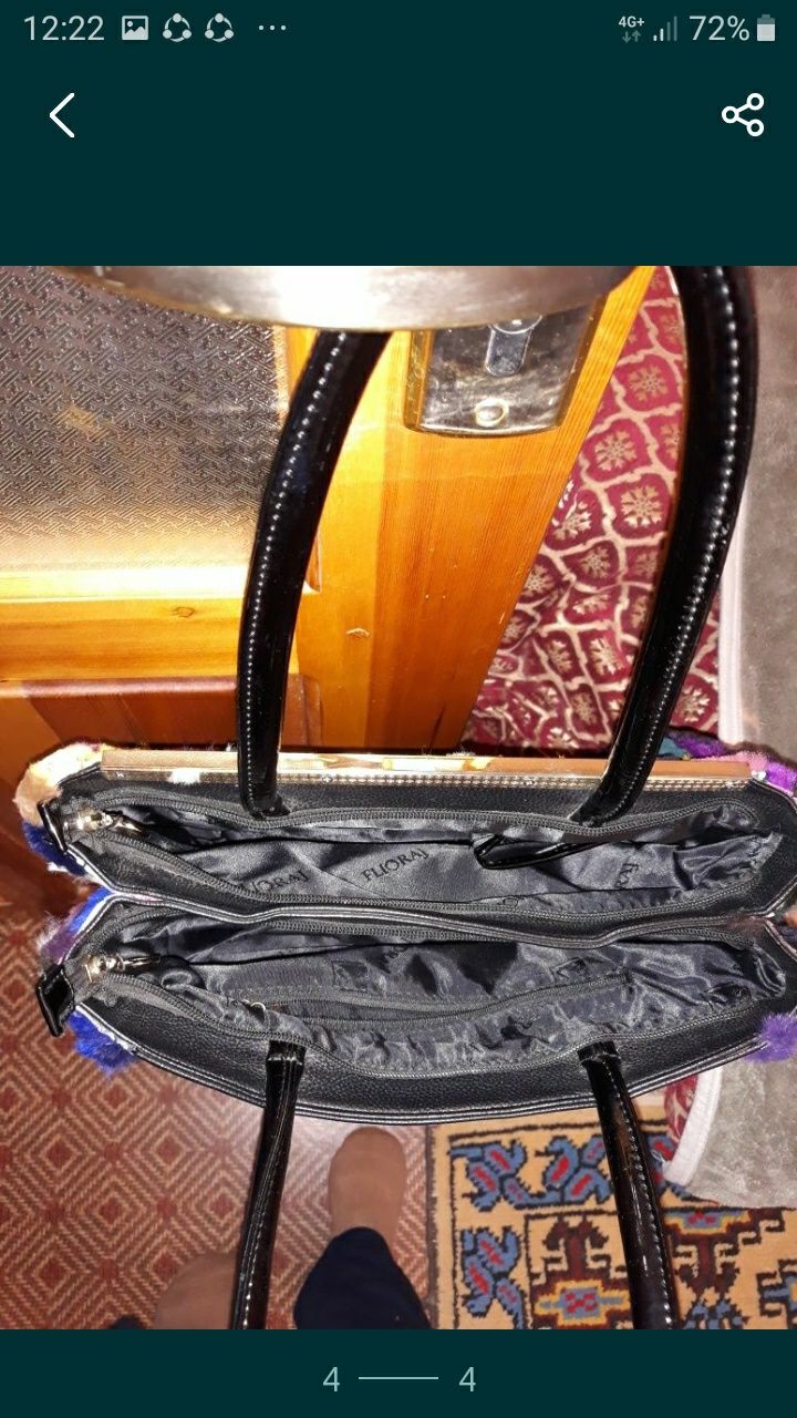 Новая привозная кожаная сумка,красивая,с натуральным мехом.