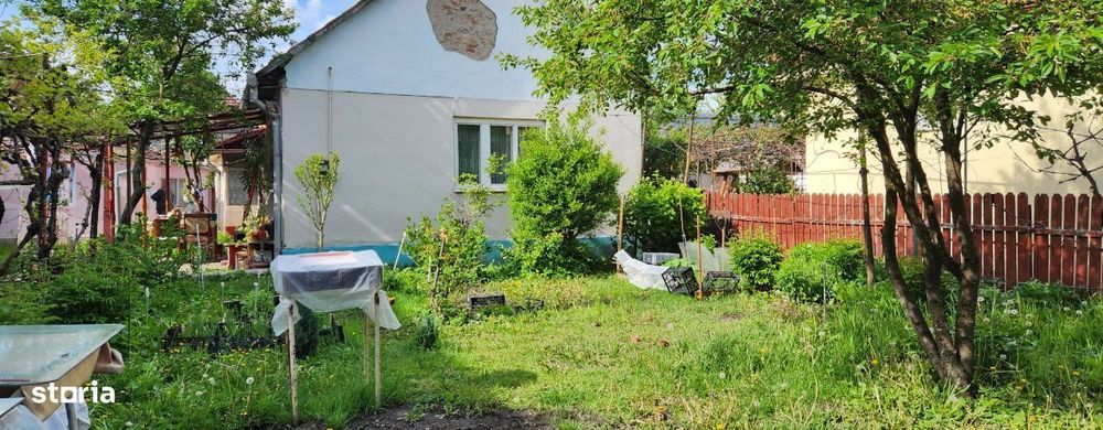 Casa 2 camere, garaj, teren 436 mp, cartier Florilor strada Crinului!