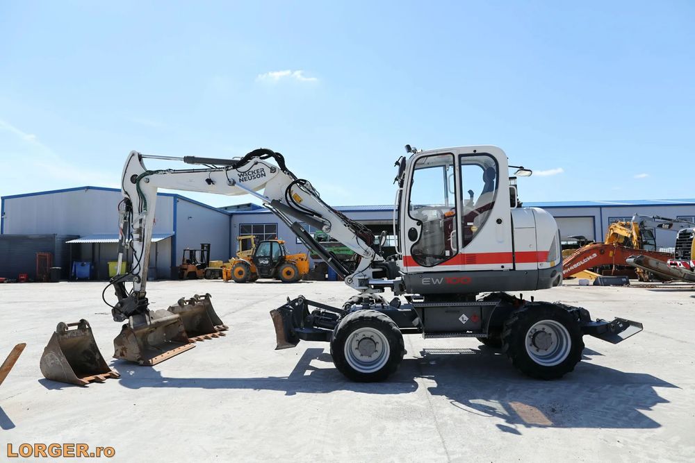 Wacker Wacker Neuson EW100 Excavator pe pneuri Wacker Neuson EW100