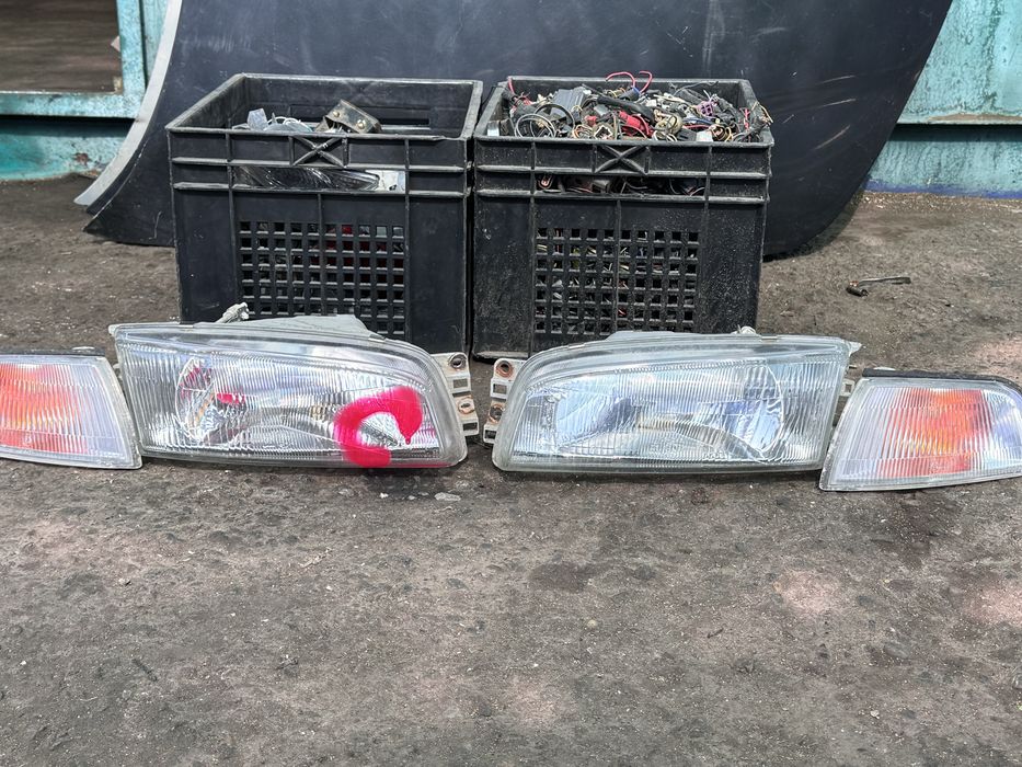 Mitsubishi Lancer передние фары 2000 года