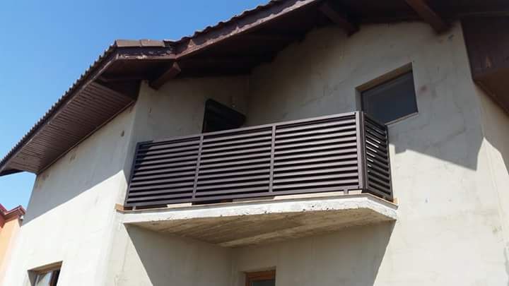 Porti tip jaluzea,porti metalice,garduri din fier