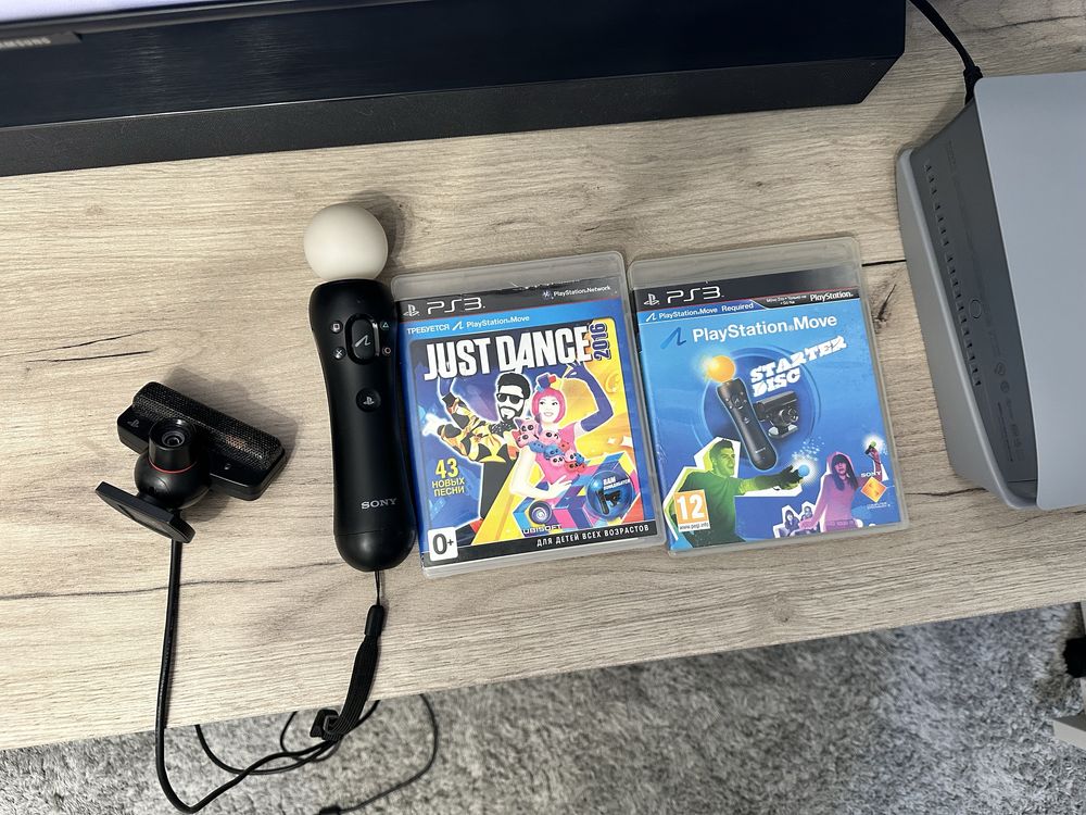 Продам комплект PlayStation Move + камера + 2 диска