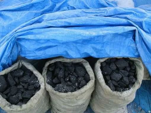 Дрова уголь в мешках