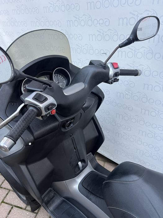 Motoideea vinde PIAGGIO MP3 300  2009 Rate