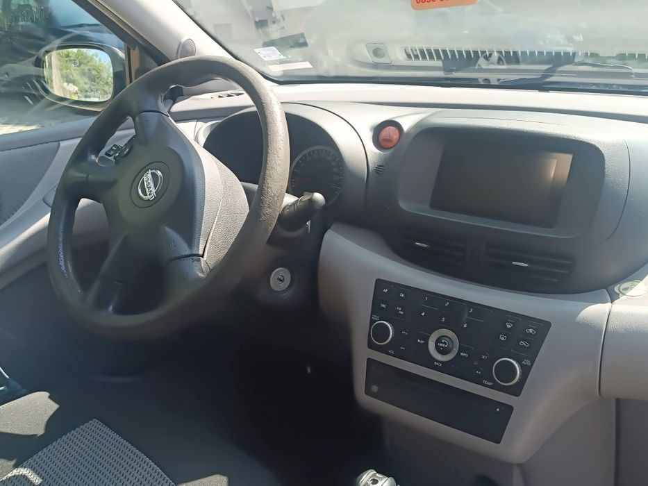 Нисан Алмера Тино