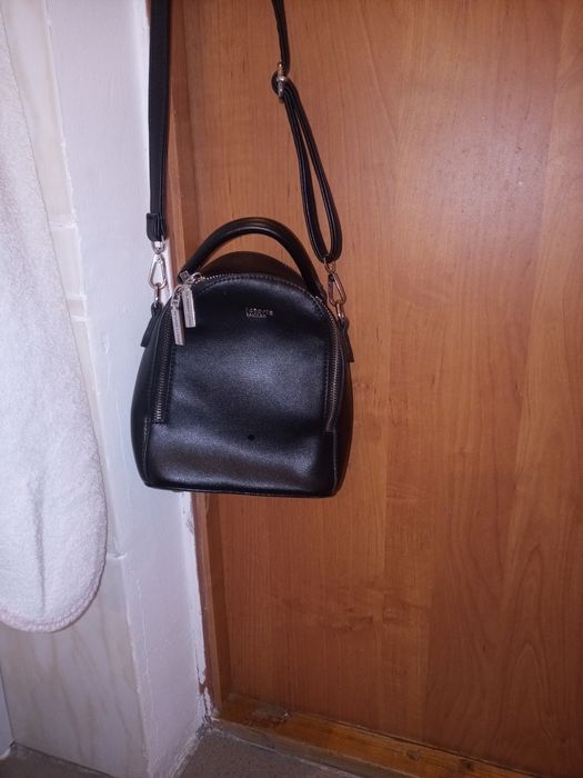 Отдам черную маленькую сумку рюкзак в хорошем состоянии. За фрукты