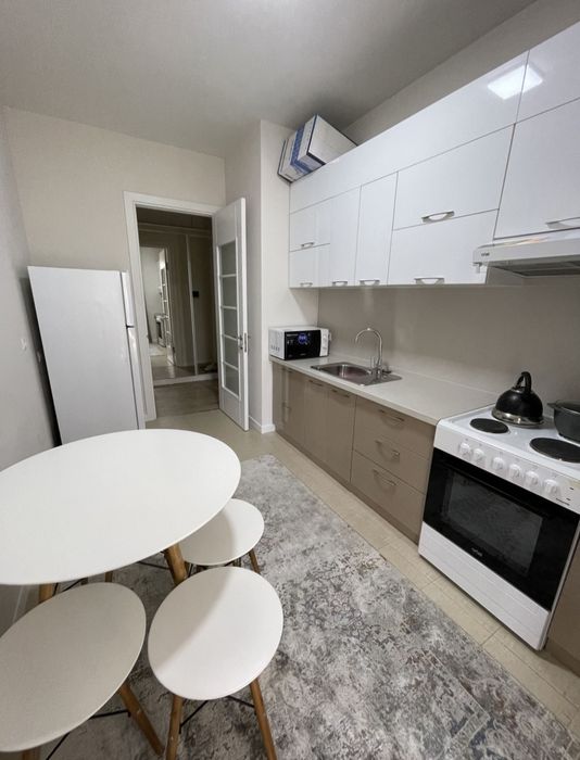 Olmazor city 1 etaj 2 xona + terrasa + garaj upakovka