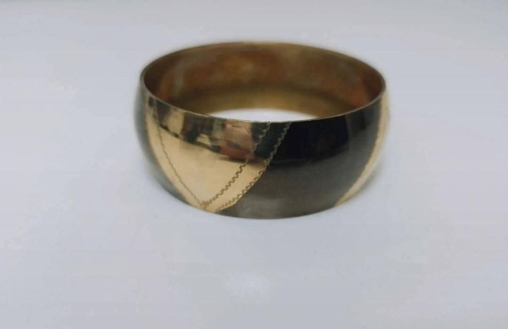 Veche bratara fixa de alama