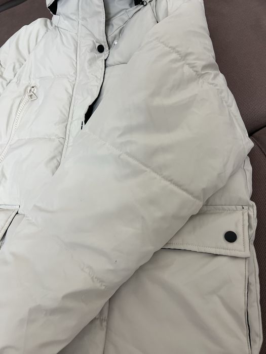 Жаңа куртка киілмеген