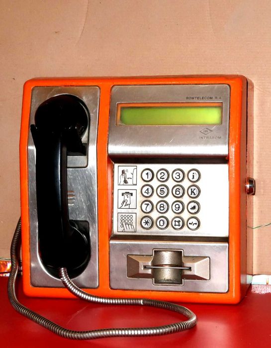 Telefon public cu cartela .