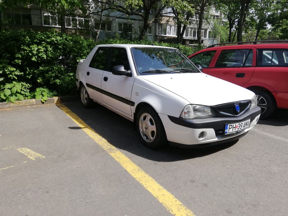 Dacia Solenza 1.4 mpi , Scala , an 2004.
