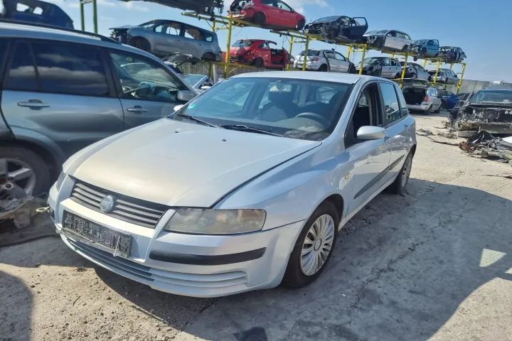 capota bara fata spate armatura grila far stanga dreapta haion portbagaj plansa bord caseta de directie motoras stergatoare chit pornire  broasca stanga dreapta fata spate  Fiat Stilo motor 1.6 benzina 182B6000   dezmembrez