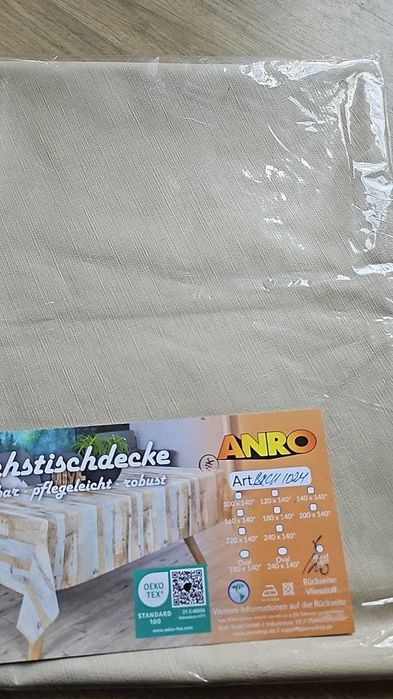 Покривка за маса от мушама, която може да се пере, кръгла или правоъг.