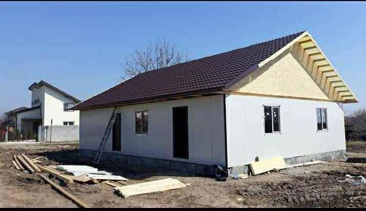 Casa modulara pe structură metalică rezistentă și invelita cu panou sa