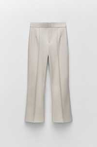 Pantaloni Zara tip imitatie de piele flare mar.XS Nou