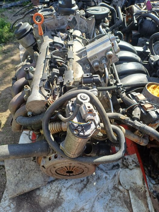 Motor golf 5 1.6 Fsi cod BKG,Cutie de viteze 5+1 viteze,alternator,