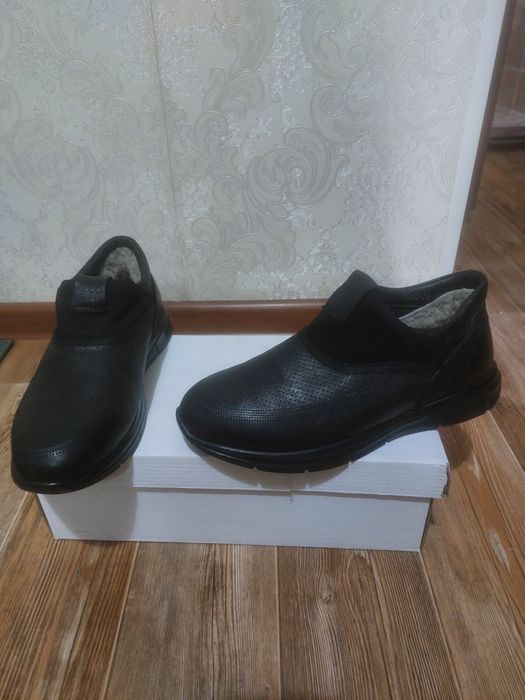 Мужские обувы...