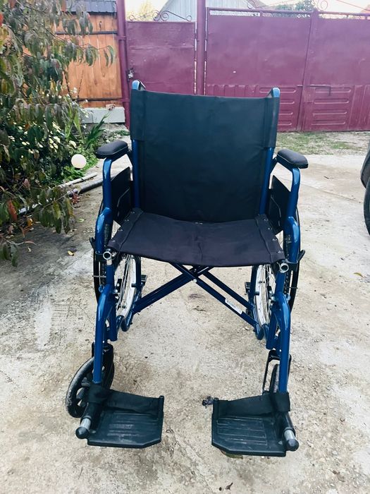 Scaun cu rotile in stare buna