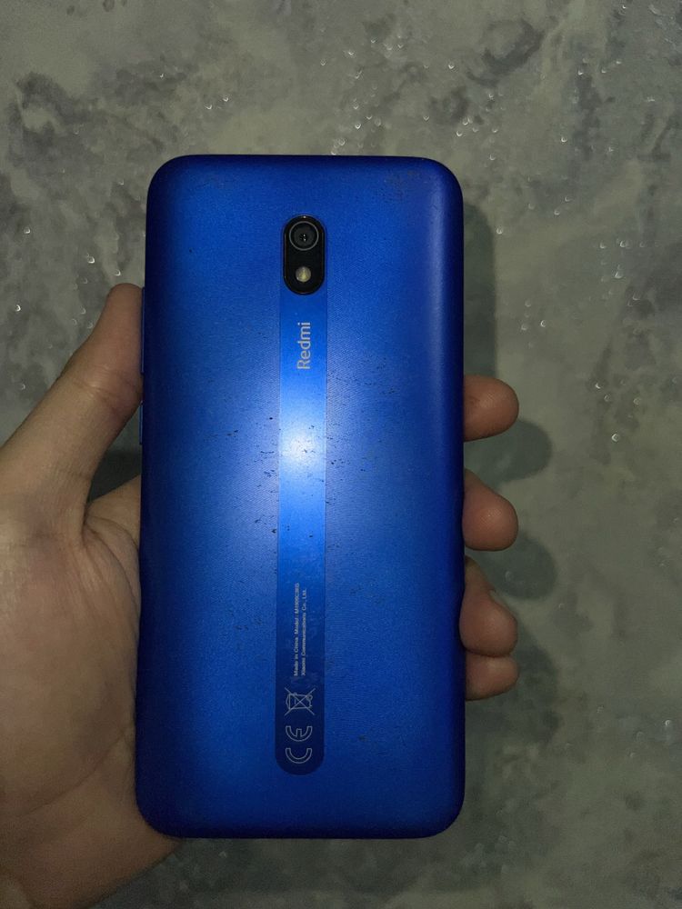 Смартфон Redmi 8A. Наушники Xiaomi Redmi Buds.