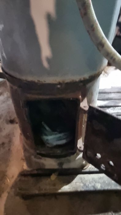 комбиниран бойлер на твърдо гориво и ток