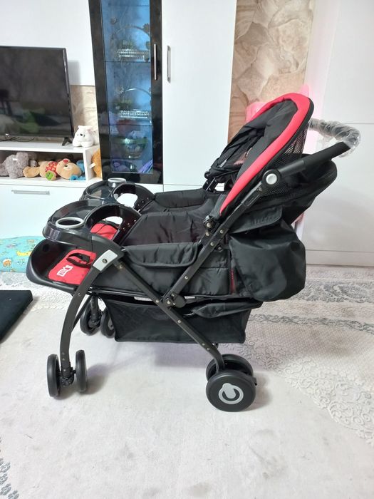 Двухместная коляска