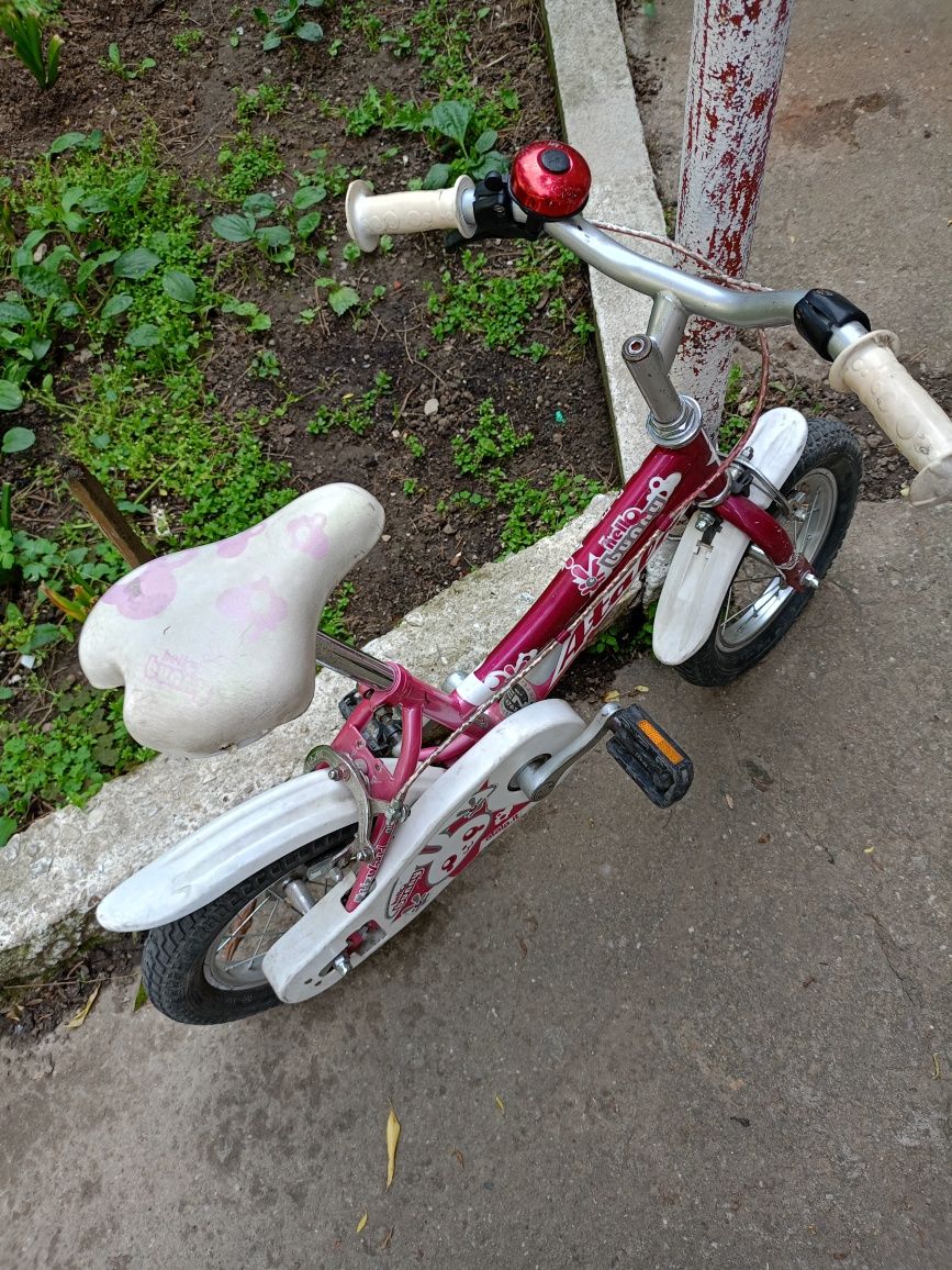 Bicicleta fetiță 3 - 6 ani mărimea roților 12 inch + roți ajutătoare