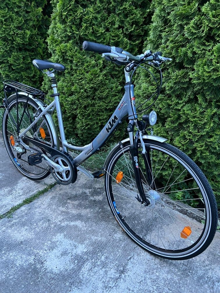 Bicicleta dama oras KTM 28" Aluminiu S/M  Dinam în butuc Shimano Deore