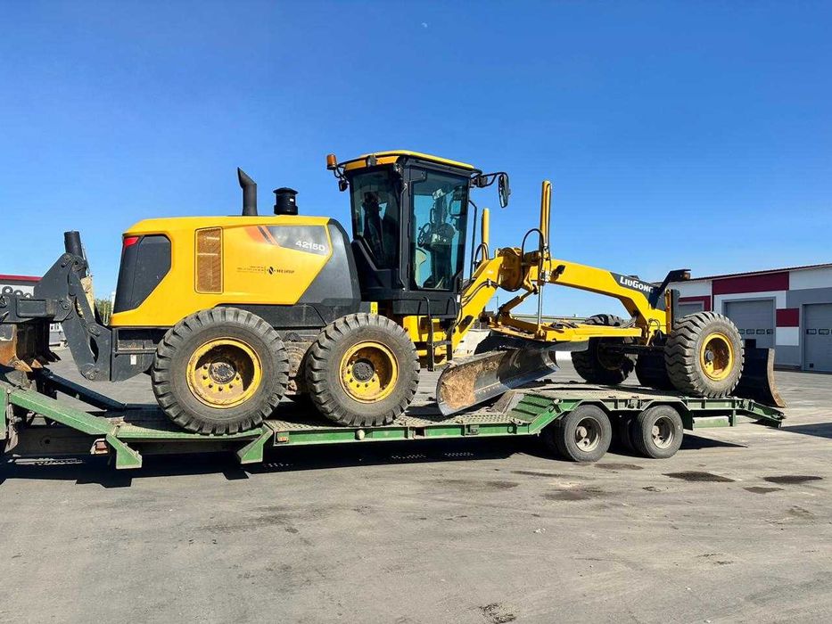 Услуги по перевозке грузов, услуги трала, катка, миксера